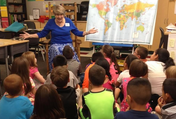 In the classroom, storytellers connect kids to the world via stories and maps.