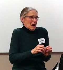 Storyteller shares a story with an animated facial expression.